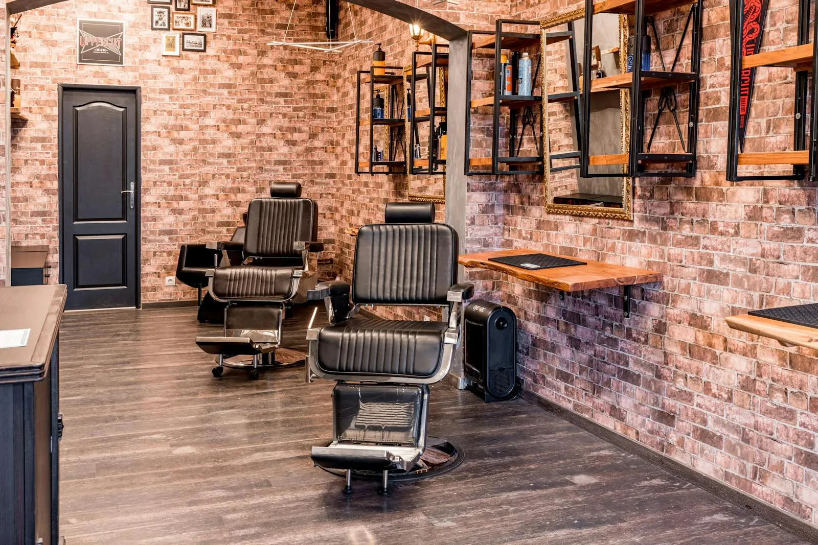 Leather barber chairs and brick interior